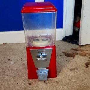 Antique vintage DAK gumball candy machine.